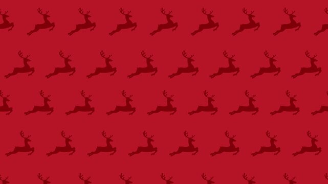 Seamless background pattern with red jumping reindeer silhouettes