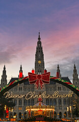 Naklejka premium The Festive Wiener Christkindlmarkt at Rathausplatz in Vienna, Austria