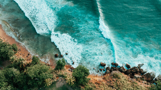 Aerial view of turquoise waves on Puerto Rico coast