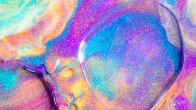 Colorful abstract liquid texture with iridescent swirl