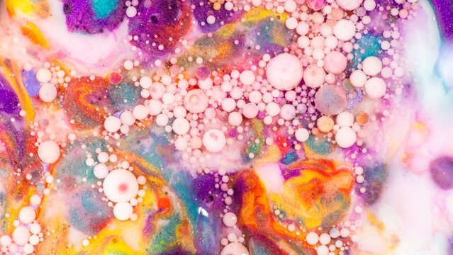 Colorful abstract fluid art with pastel bubble texture