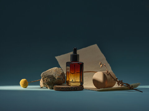 A stylish serum bottle with natural elements
