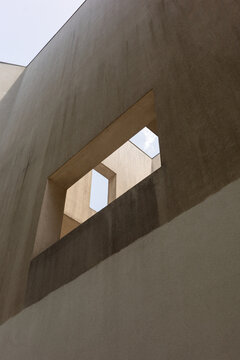 Abstract geometric architecture framing the sky