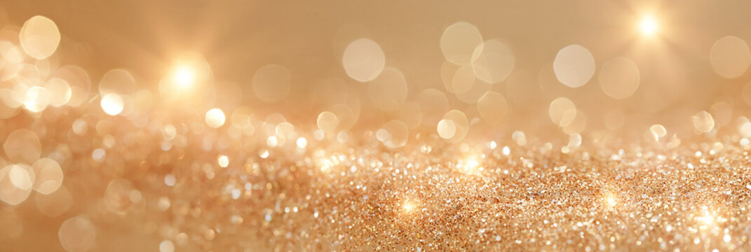 Abstrakter goldener Bokeh-Hintergrund mit funkelnden Lichtpunkten in Beige