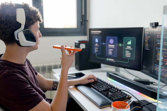 Young man use AI tools at gaming computer