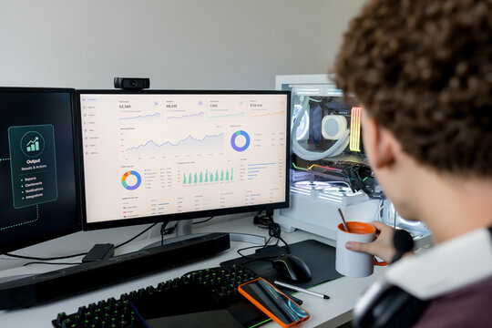 Young man using AI tools on a gaming computer