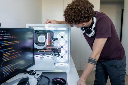 Young man inspect gaming computer with AI tools