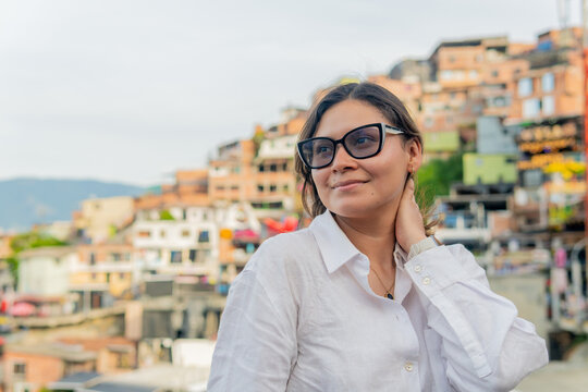Young woman enjoying comuna 13 view in medellin