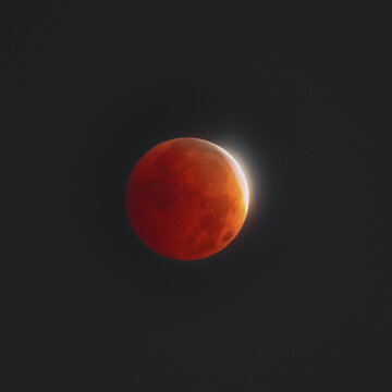 Partial Lunar Eclipse Glowing Red in the Night Sky
