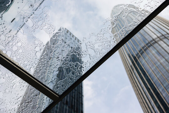 Rain Droplets on Glass with Skyscrapers