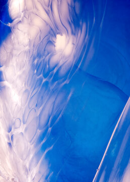 Abstract blue and white pattern in handmade glass vase