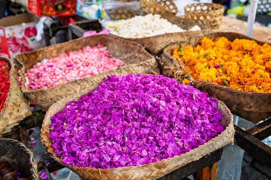 Colorful fresh flower petals at traditional Balinese market