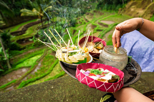 Balinese offering tray overlooking Tegallalang rice terrace