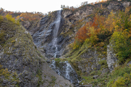 Polikarya waterfall in autumn, Krasnaya Polyana, Sochi, Russia