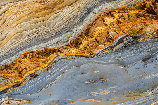 Colorful sedimentary rock layers with natural texture