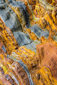 Colorful sedimentary rock formation with layered natural texture
