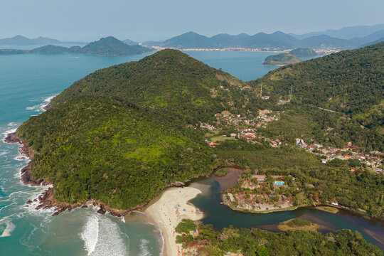 Aerial view of Ubatuba beach, Forest and coastal lagoon