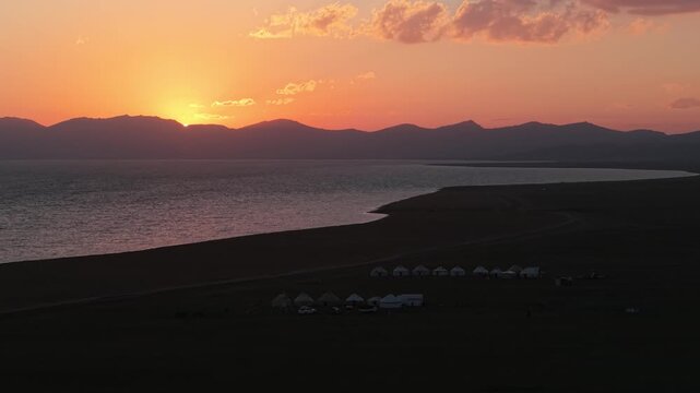 Song Kul Lake Kyrgyzstan drone aerial 4k at sunset