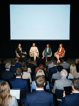 Business executives speak at corporate conference panel