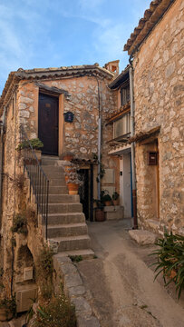 Stone staircase with potted plants in Tourrettes-sur-Loup, France. 