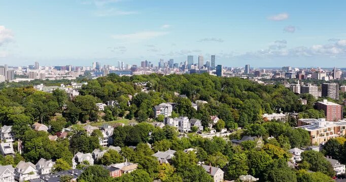 Aerial Reveal of Boston Skyline Behind Corey Hill in Brookline Massachusetts