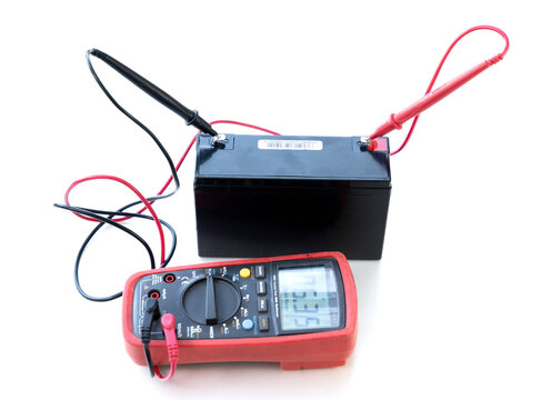 Digital Multimeter Testing Voltage Of Sealed Lead Acid Battery