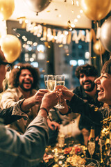 Fototapeta premium Friends Toasting at a New Year’s Eve Party
