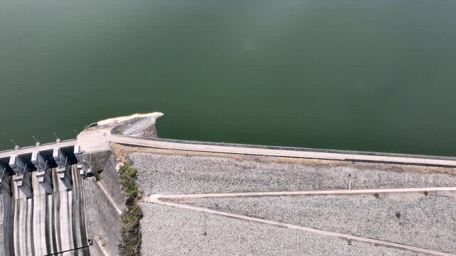 El Quimbo Reservoir Surrounded by Mountains along the Magdalena River in Huila, Colombia. Establishing Shot. Aerial View.