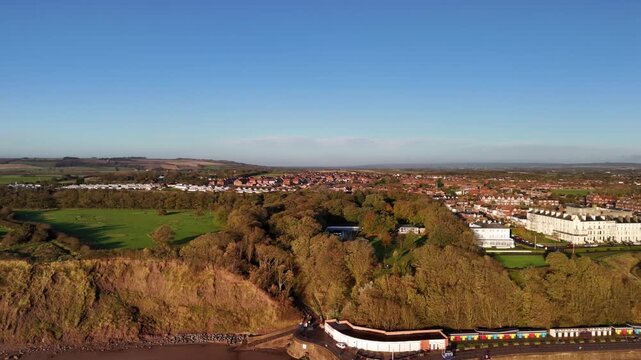 Aerial View of Filey Seaside Town with Beach Huts and Yorkshire Countryside Backdrop