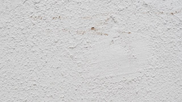 Rough white plaster wall texture background