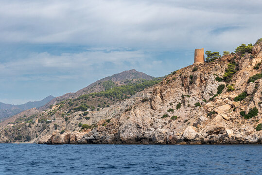 Ancient Arab watchtower on the cliffs of the Maro-Cerro Gordo natural area, Andalusia, Spain