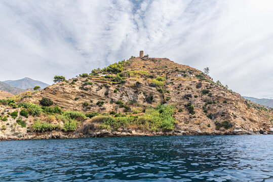 Rocky coastal landscape without beaches in the Maro-Cerro Gordo natural area, Andalusia, Spain