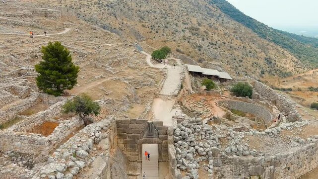 Mycenae, Greece. Excavation site: Greek settlement of the 12th century BC. e. with the ruins of the acropolis, palace and tombs. Drone footage