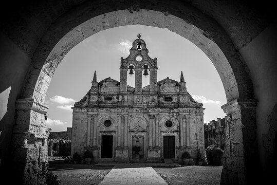 Arkadi, Greece - October 03, 2026 - Unobstructed View of Church Facade and Main Entrance Arch at Arkadi Monastery
