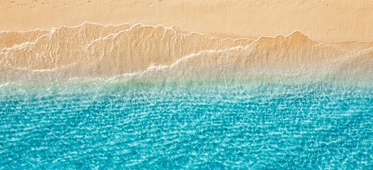 Naklejka na ściany i meble Aerial golden sandy beach ripples meeting turquoise crystal ocean waves abstract minimal top down summer coast. Peaceful nature seascape design scene. Artistic drone pattern paradise travel wanderlust