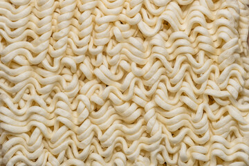Obraz premium Instant Ramen Noodles Close-Up Dried Food Texture Background