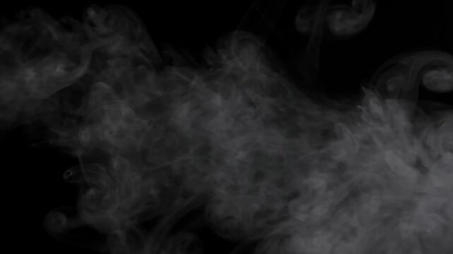 Gray smoke swirls drifting slowly on black background, ethereal motion video