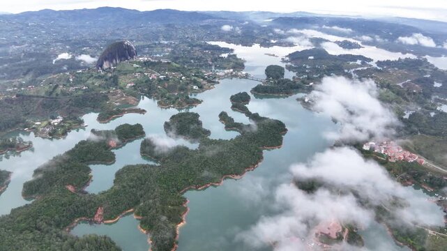 Scenic Guatap&eacute; Lake and Green Islands Surrounded by Mountains in Antioquia, Colombia. Establishing Shot. Aerial View.