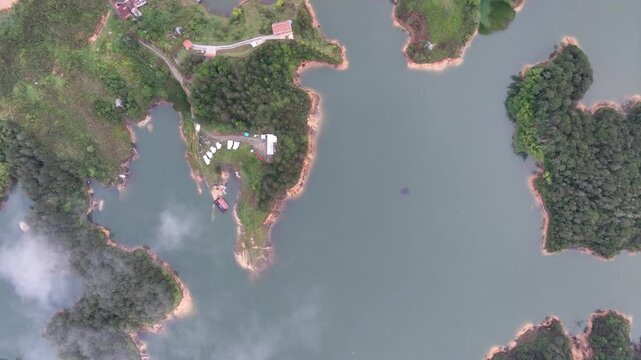Guatap&eacute; Reservoir with Islands and Mountain Landscape in Antioquia, Colombia. Establishing Shot. Aerial View.