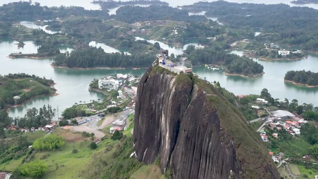 Guatap&eacute; Tourism Landscape with Piedra del Pe&ntilde;ol, Reservoir and Scenic Islands in Antioquia, Colombia. Establishing Shot. Aerial View.