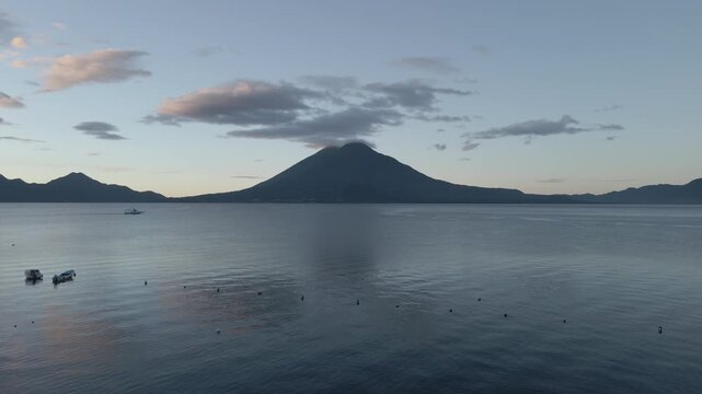sunrise at the mayestic atitlan lake guatemala. drone shot