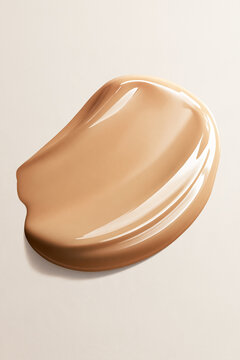 Liquid foundation or BB cream swatch displaying smooth texture, color, and fluid consistency for skincare and makeup concepts