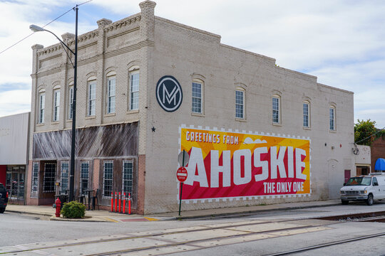 Ahoskie North Carolina - September 25 2026: Historic Building in Ahoskie North Carolina With Mural Saying Greeting From Ahoskie