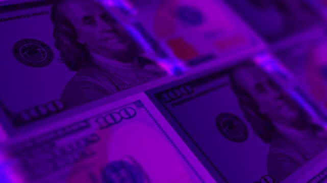 Purple light bar sweeping across a banknote in an ultraviolet check