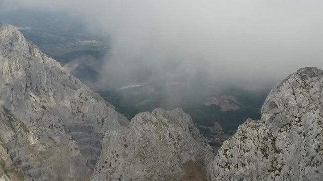 aerial view of hikers in the mountains of the Basque Country
