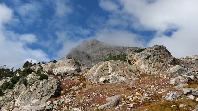 Autumn Alpine Landscape with Clouds Flowing Over Shoshoni Peak in Colorado