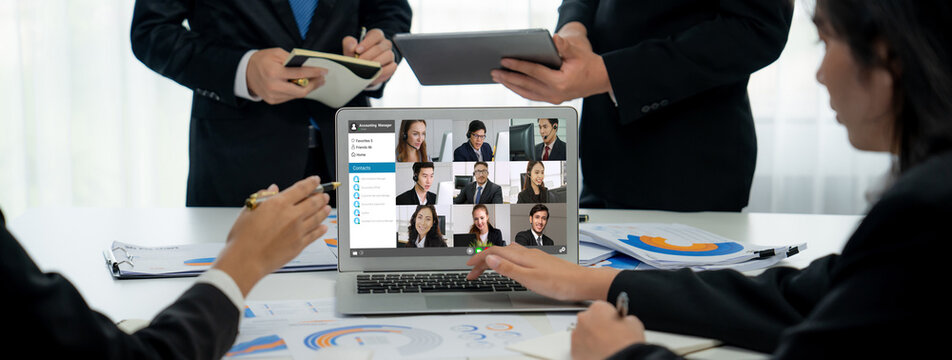 Business people on video conference for brisk virtual group meeting of corprate business office workers