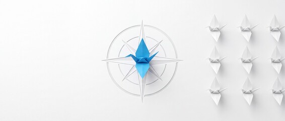 Fototapeta premium Conceptual leadership and direction metaphor featuring a blue origami crane at the center of a compass rose surrounded by a row of white paper birds on a clean white background.
