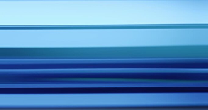 Radiant blue lights illuminate the brilliance of moving reflective glass creating a gradient of soft blues for a calm, relaxing aura. Smooth dreamy blue lighting abstract background or wallpaper Loop