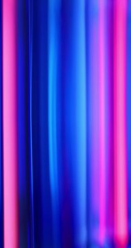 Contrast of red and blue lights illuminate the brilliance of a reflective glass creating a moving gradient of vivid neon colors. Smooth blends of reds and blues abstract background or wallpaper Loop